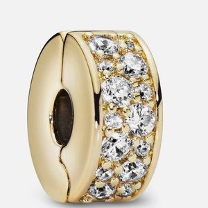 Authentic 14K yellow gold clear pave Pandora clip charm.